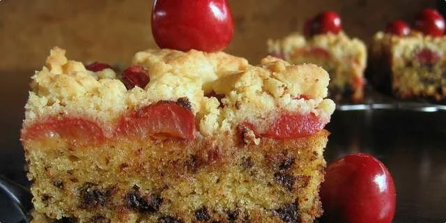 A crumbly cake with cherries